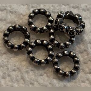Pandora bracelet spacers.